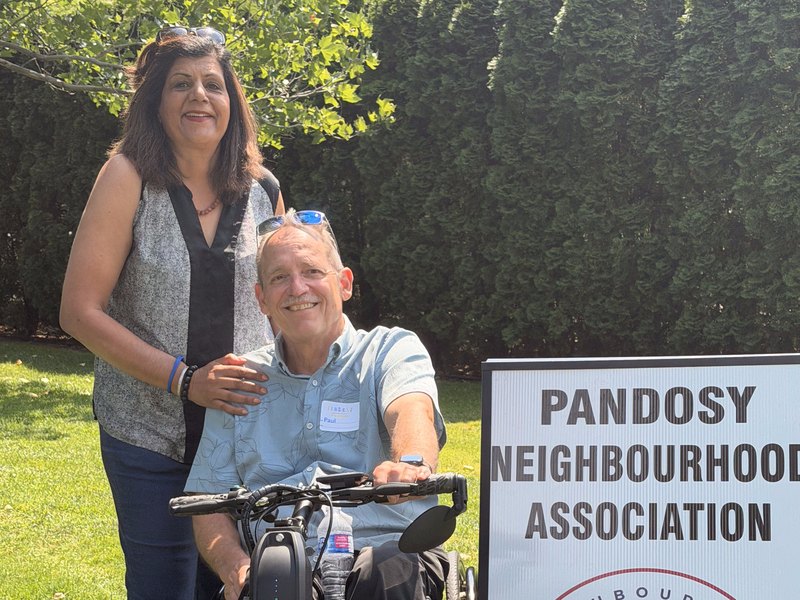 Mohini Singh with Paul Clark at the Pandosy Neighbourhood Association BBQ